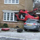 Illustration for article titled Crash Leaves Audi TT Embedded In House
